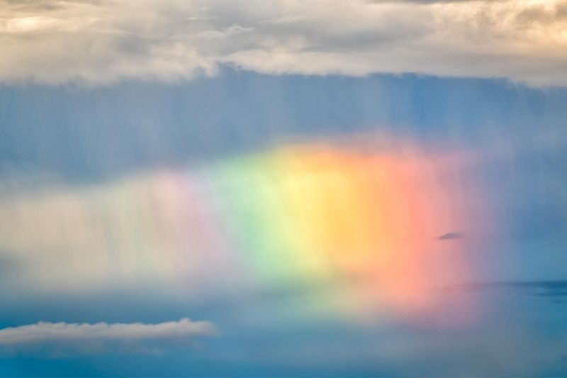 arc-en-ciel représentant le lien entre le monde de l'au-delà et le monde incarné